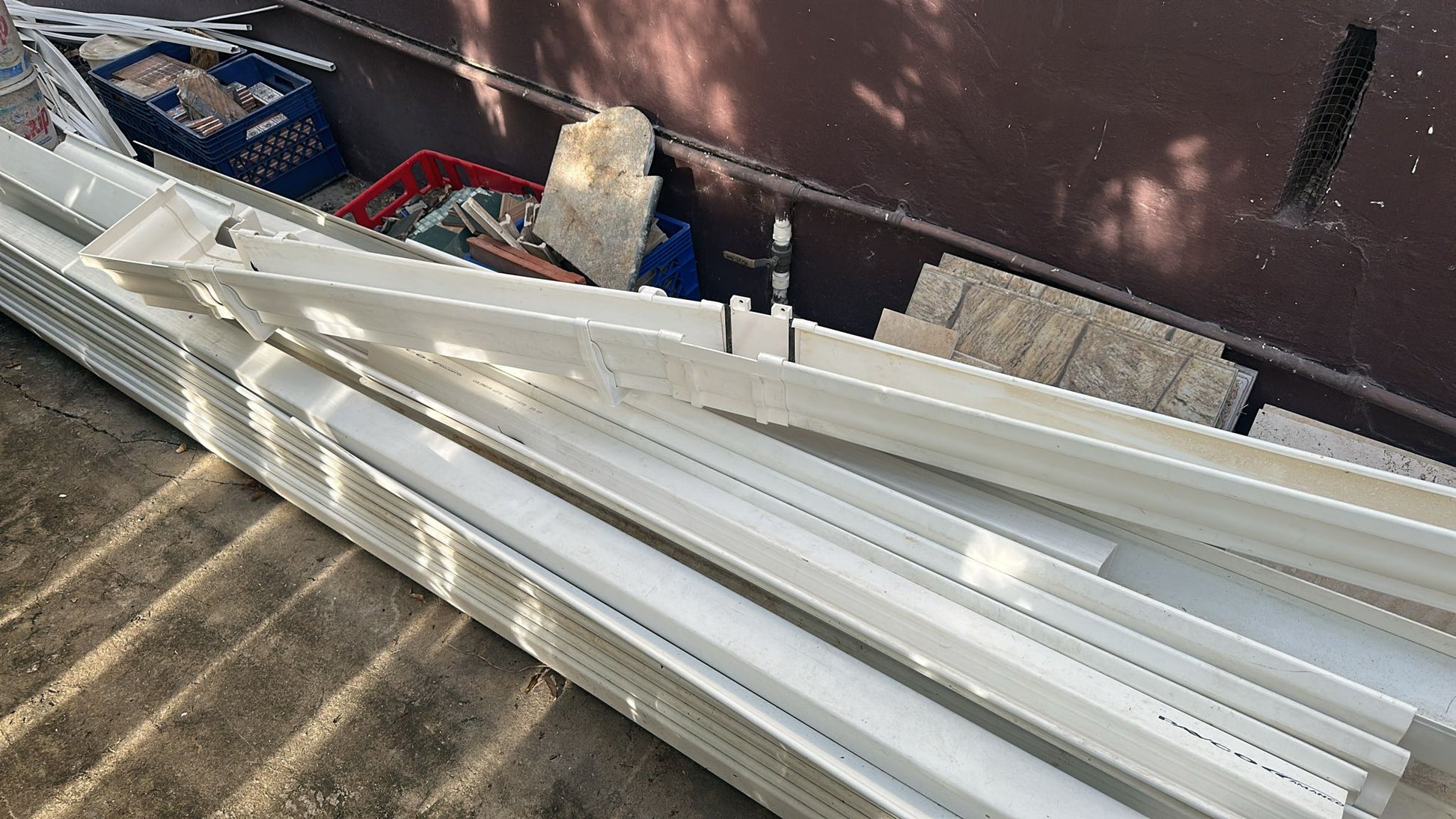 150 Feet  White Plastic Gutter Sections