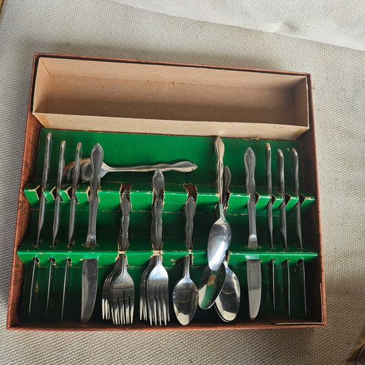 35-Piece Stainless Ornate Handle Flatware Set