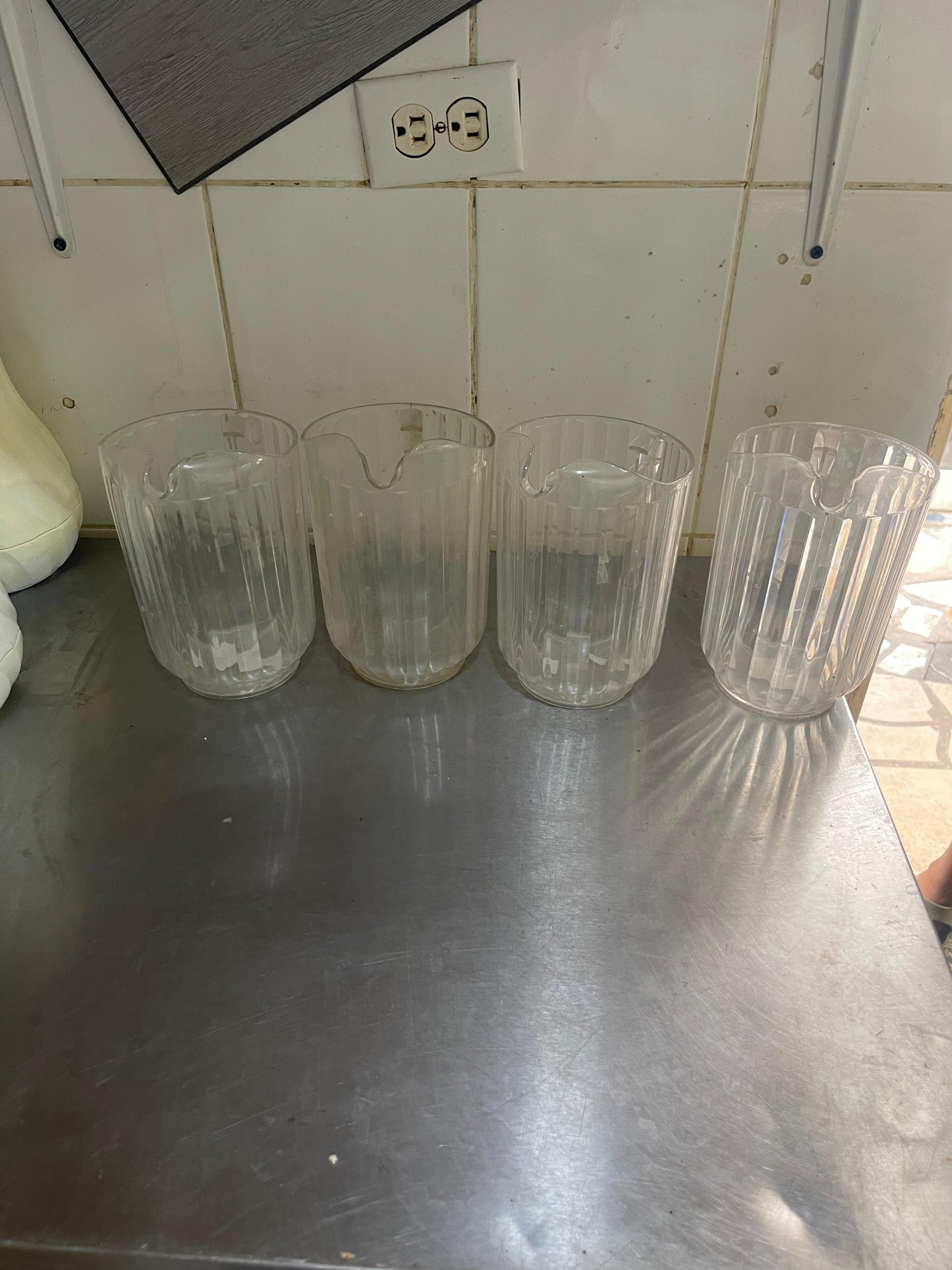 4 Clear Plastic Pitchers