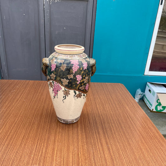 Ornate Ceramic Vase with Grape Vine Pattern