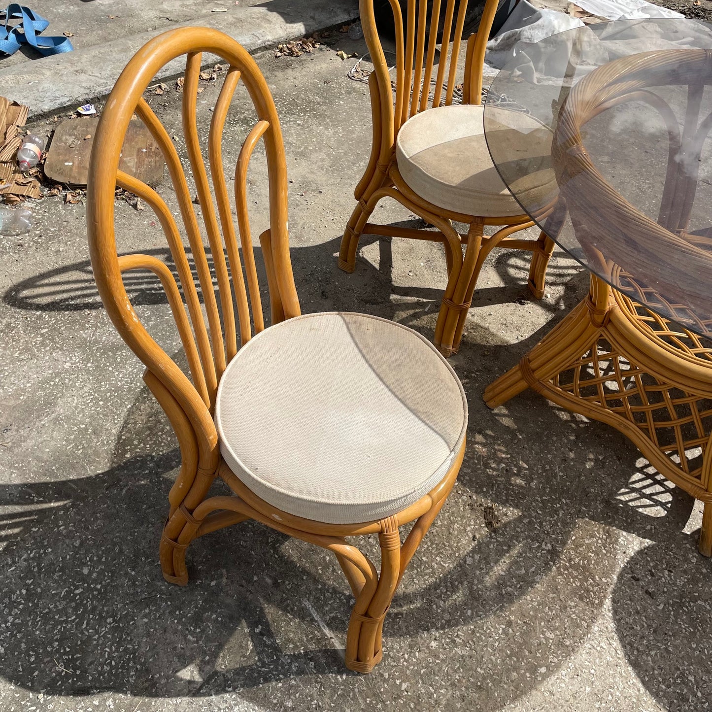 Rattan Dining Table with Glass Top + 4 Rattan Chairs with Cushions