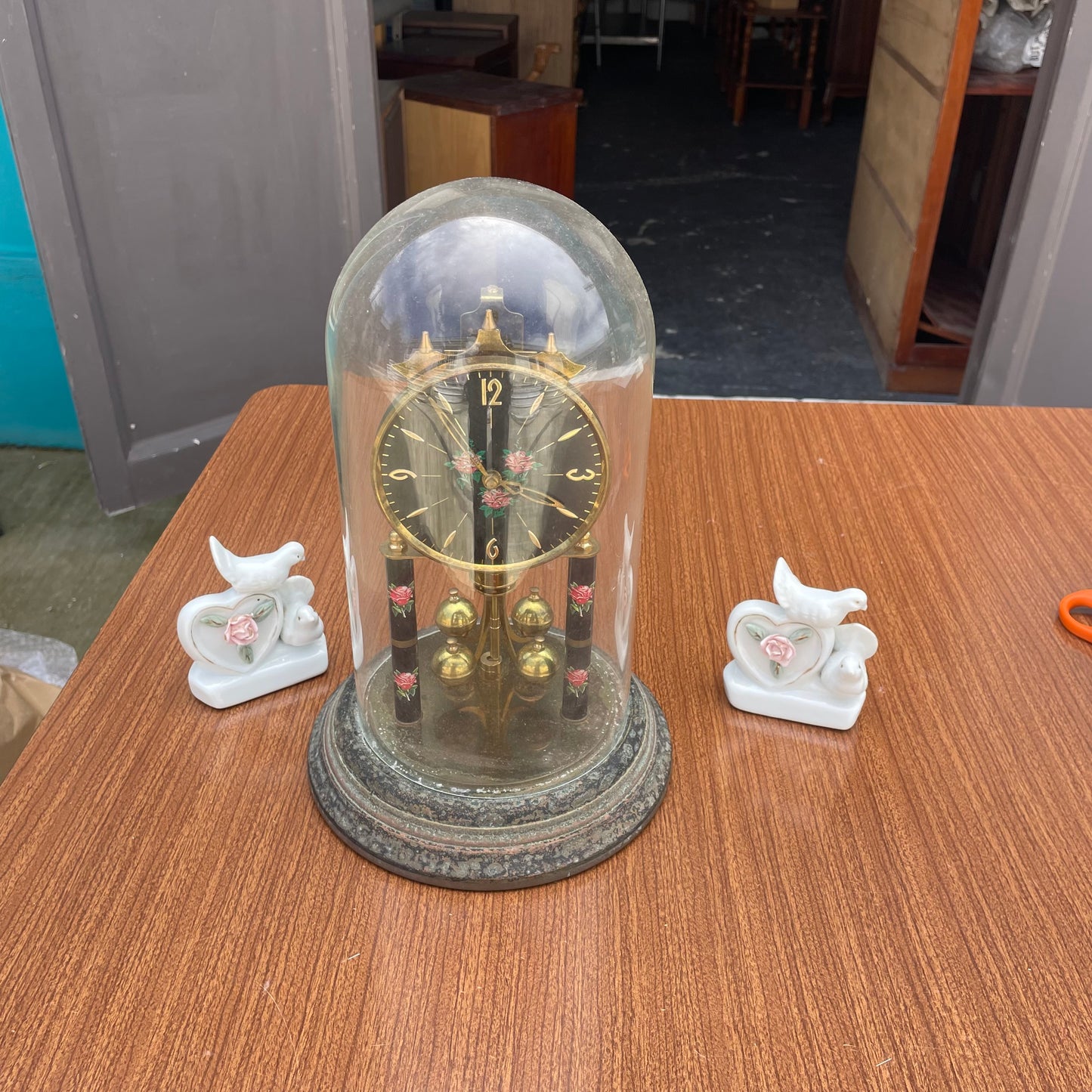 Vintage Glass Dome Perpetual Motion Clock with Rose Dial